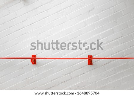 Minimalist Rail Red Line with Textured wall