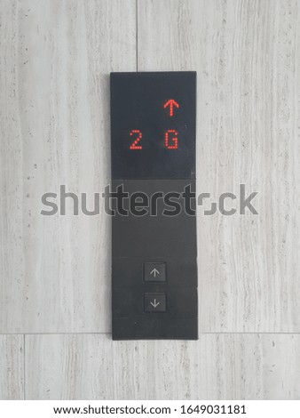 a switch of elevator , up and down arrow 