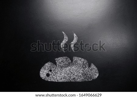Bread. Drawing on a black chalkboard