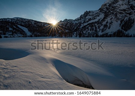 Snow at sunset on the Alpe Devero plain