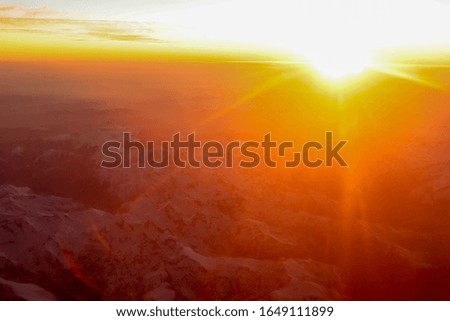 Fantastic view of the sunset and The Pyrenees mountains from a plane