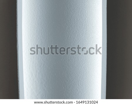 Macro photo of white illuminated wall with LED lights