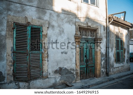 The wooden doors of a building during daytime