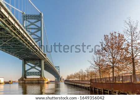 Park, Delaware River, and Benjamin Franklin Bridge into downtown Philadelphia, Pennsylvania