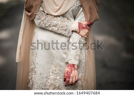 Henna On Hands Of Malaysian Wedding Bride