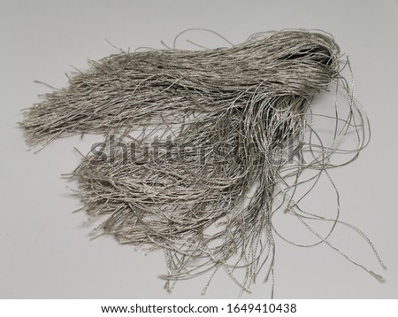 pile of silver thread. isolated on white background 