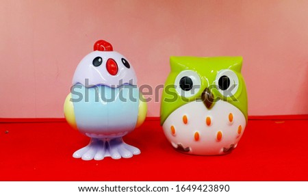 Toy of an Owl and a Hen made with plastic