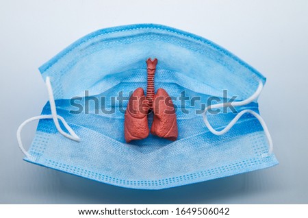 Surgical masks protect the lungs from the virus Royalty-Free Stock Photo #1649506042