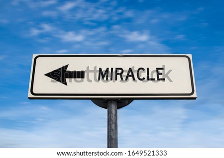 Miracle road sign, arrow on blue sky background. One way blank road sign with copy space. Arrow on a pole pointing in one direction.