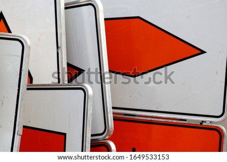 Detour orange and white traffic signs	