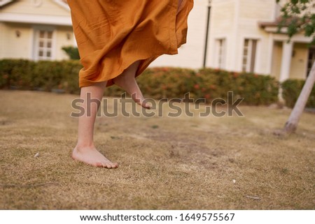 female legs walk on the ground