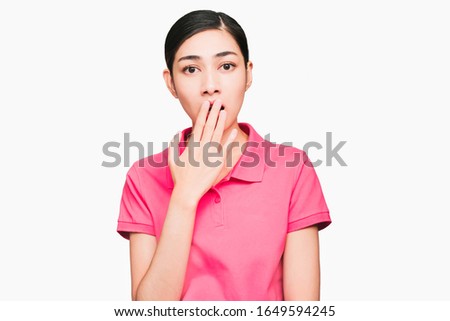 Young smart beautiful asian woman wore pink t shirt,Hands closed her mouth Surprised, Excellent, Shocked, isolated on white background