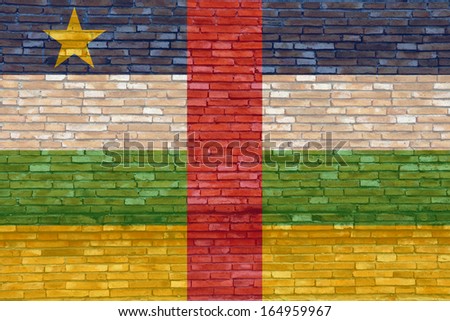 Central African Republic flag on texture brick wall. 