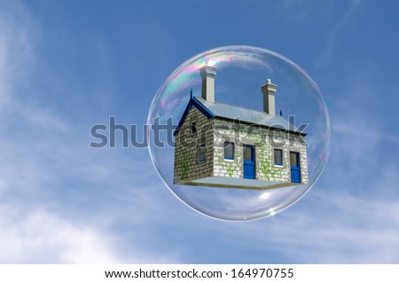 House in a bubble fly in the air. Concept photo of Real estate market bubble, housing market, subprime mortgage crisis Home loans, Mortgage loans. No people. Copy Space