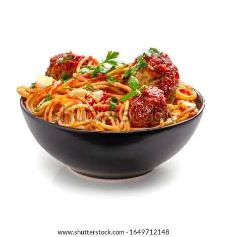 Pasta with meatballs, parmesan and tomato sauce in a clay bowl. Homemade Italian spaghetti isolated on white background. Royalty-Free Stock Photo #1649712148