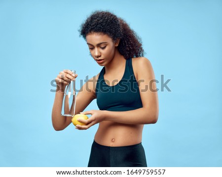 Athletic woman exercising slim figure workout gym motivation 