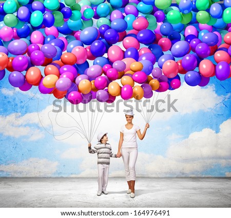 Image of young happy smiling family walking