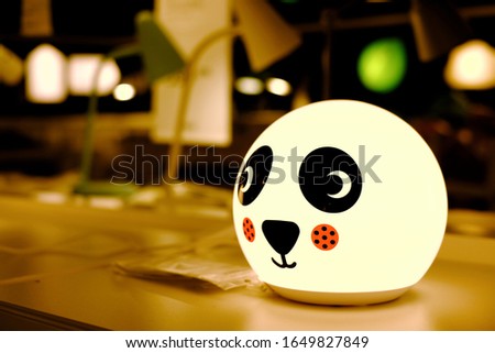 the cute panda in the lamp style for decorate the child room.