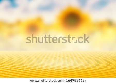 Honeybee Wax Golden Foreground for Products Display on Blurred Sunflowers Field Background