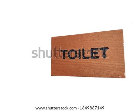 Toilet sign on wooden with isolated on white background.