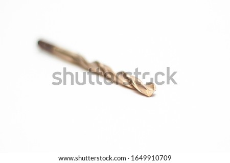Metal drill on a white background