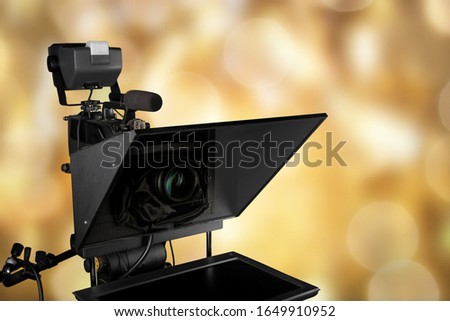 Professional television camera lens on background