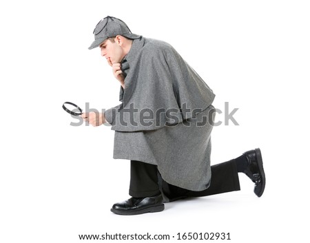 Man dressed as detective Sherlock Holmes. Royalty-Free Stock Photo #1650102931