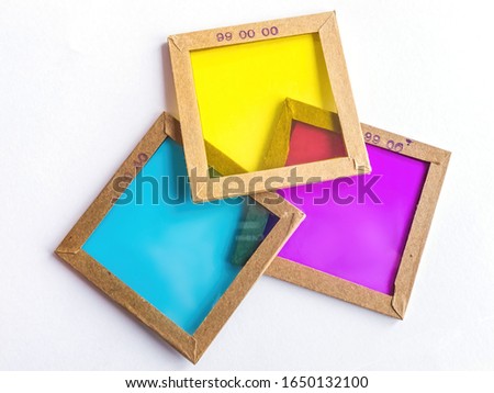 Three old color corrective filters for color photo printing