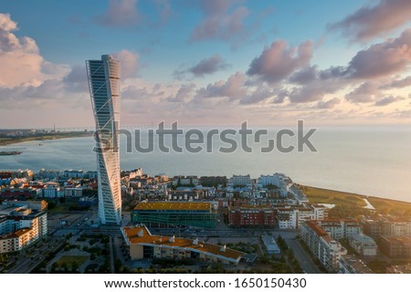 Beautiful aerial panoramic view of the Malmo city in Sweden by the sea with the Oresund bridge visible on the horizon. Royalty-Free Stock Photo #1650150430