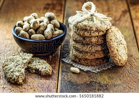 Domestic sweet biscuit stacked biscuit with sesame, peanuts, sunflower and other seeds.