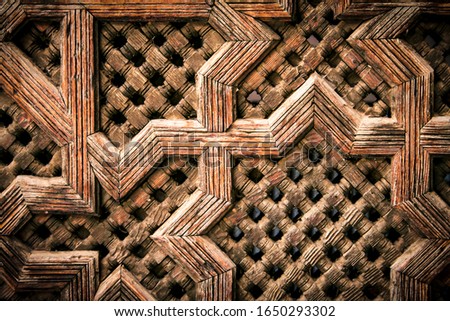 Close up of ornamented arabic wooden wall
