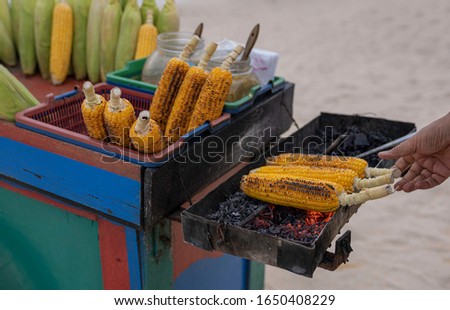 Grilled corn, cooked right on the beach. Bali Indonesia