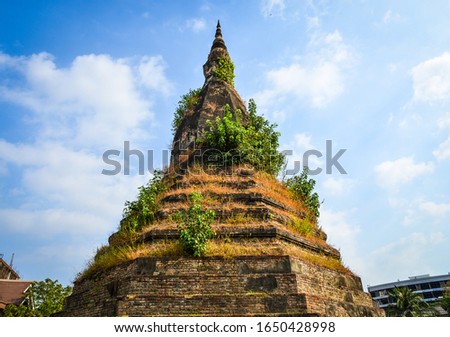 That Dam, ancient black stupa believed to house a mythological Naga serpent in Vientiane, Laos.