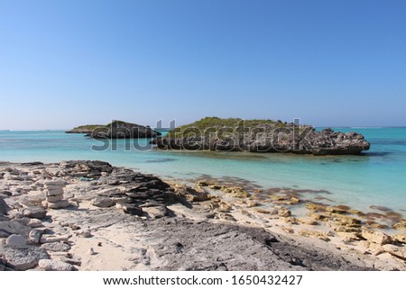 Small rocky islets off the coast of North Caicos. Three Mary Cays caribbean ocean view Royalty-Free Stock Photo #1650432427