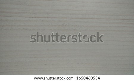 wallpaper with a pattern of wood fibers with the basic color ivory and light brown wood fibers. selecting the right colors can make the room feel more comfortable atmosphere and fun to work