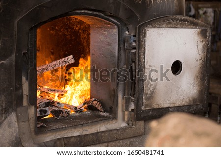 steel Kiln burning wood fuel