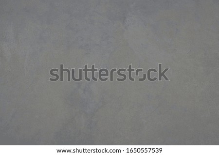 Gray background from the wall with an attractive texture.Old gray blue concrete shabby wall. Texture background.