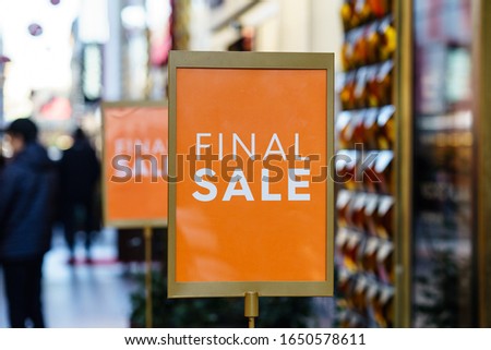 Sale sign in clothes shop.shopping and discount concept. Retail Image Of A Final Sale Sign In A Clothing Store