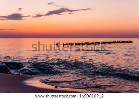 Beautiful sunset at baltic sea. Sea sunset background.