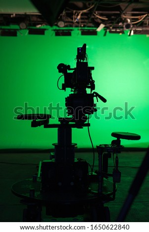 Shooting studio with professional equipment and green screen