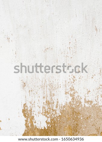 Old white painted wall with aged structure plaster