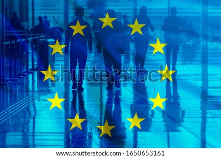EU Flag and group of People as silhouettes, concept picture