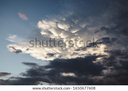 Picture of a stormy cloudscape at sunset.