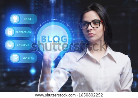 Business, Technology, Internet and network concept. Young businessman working on a virtual screen of the future and sees the inscription: Blog