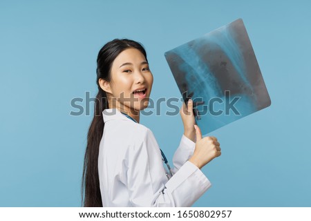Female doctor medicine white coat x-ray health diagnosis