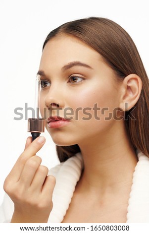 Beautiful woman cosmetics clean skin health rejuvenation cream