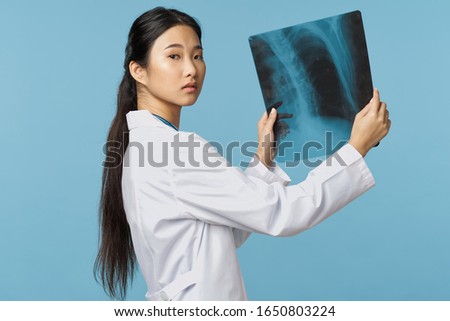 Female doctor medicine white coat x-ray health diagnosis
