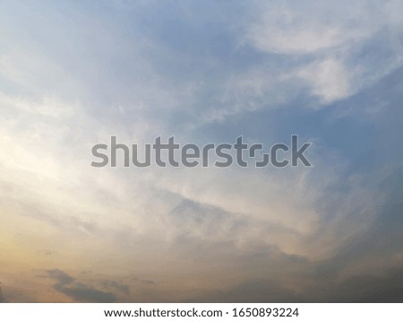 Beautiful cloudy on sky background with sunlight at dusk 