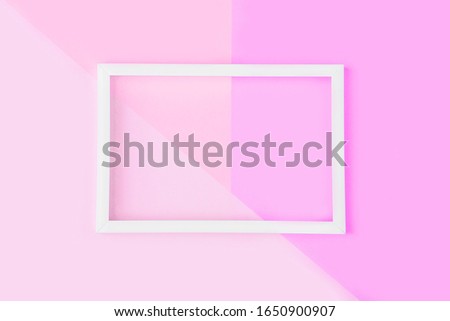 Empty white frame on a duotone pink background  with copy space for text or lettering. Minimal geometric lines composition. Top view, flat lay, mock up.
