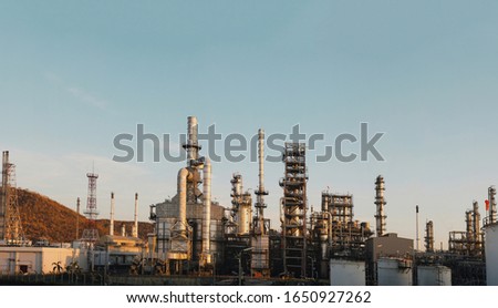 Panorama Oil and gas industrial, Refinery Oil storage tank and pipe line steel on morning sunlight background.